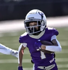 Kaiden Kent Running on Football field